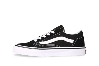 A side view of a black Vans Old Skool sneaker with a white stripe.
