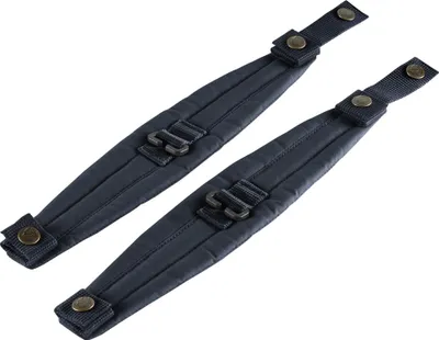 Two dark gray shoulder pads for a backpack, shown diagonally against a white background.
