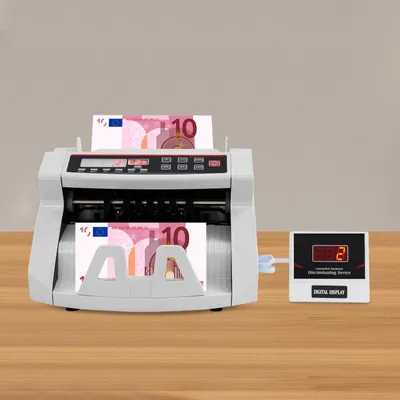 Image de Compteuse de billets - Appareil portable - 900 billets/min - Écran LED - Chargeur arrière - Contrôle à la loupe - Compatible multi-devises - Fonction de totalisation - Blanc