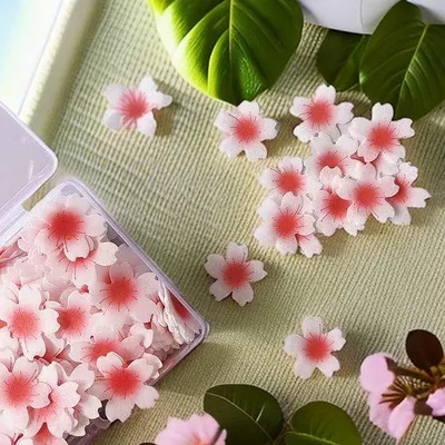 Produktbild von 100 Stück/Box leckere Blumenkronen für Cupcakes, dekorative Kleberollen aus Papierschummi für Kuchen und Cupcakes, ideal für Hochzeiten, Geburtstagsfeiern, Cupcakes, Glaze und Dekorationen