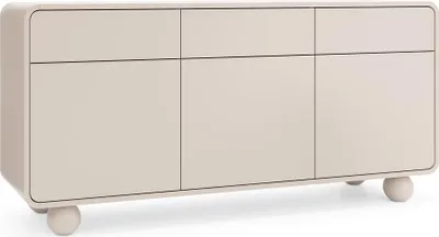 A light beige sideboard with three doors and three drawers, supported by spherical legs.