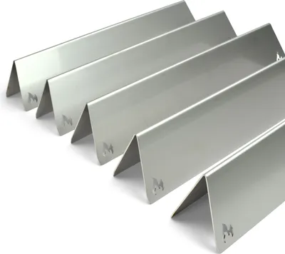 A set of stainless steel grill heat shields arranged in a V-shape.