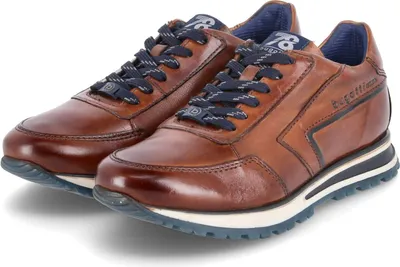 A pair of brown leather sneakers with blue laces and white soles, presented on a white background.