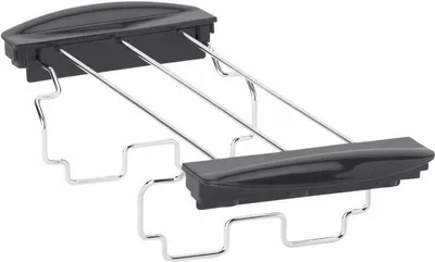 A toaster accessory for warming bread rolls.