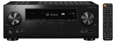 A black Pioneer AV receiver and its remote control are shown against a black background.