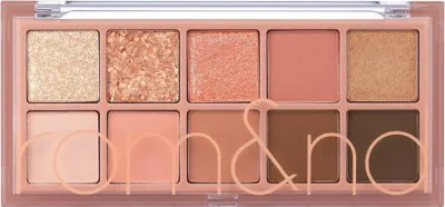 A top-down view of an eyeshadow palette with ten different shades.