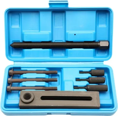 A tool kit for motorcycle crankcase separation, laid out in its blue plastic case.