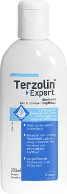 A white bottle of Terzolin Expert shampoo for dry scalp.