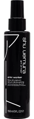 A black bottle of Shu Uemura Shiki Worker hair serum.