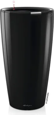 A tall, glossy black planter with a water level indicator visible at the top.