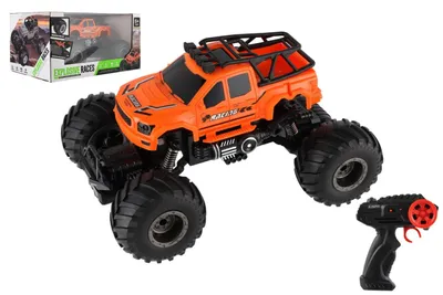 Immagine prodotto di Auto RC pick-up fuoristrada in plastica, 23 cm, 2,4 GHz, a batteria, con luci, arancione, in scatola. 30x15x19 cm
