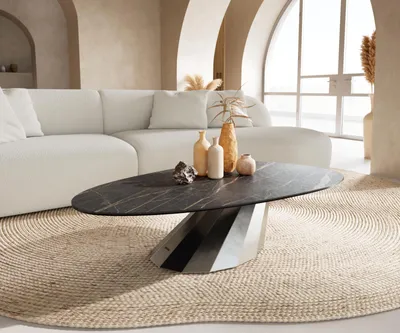 Produktbild von DELIFE Couchtisch Edge Oval 140x75 cm Keramik Laminam® Noir Desir Braun Parabi Edelstahl gebürstet
