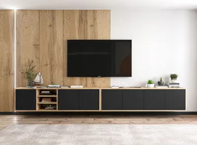 A modern living room setup with a wall-mounted TV and a long, low media console.