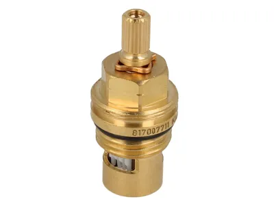 A close-up studio shot of a brass faucet cartridge.
