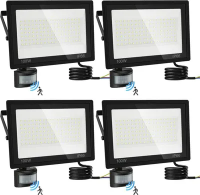 Four black LED floodlights with motion sensors are arranged in a 2x2 grid on a white background.