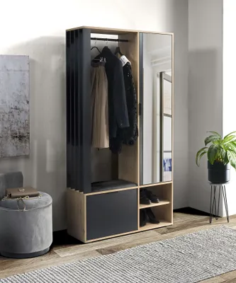 Produktbild von Minio Garderobenset Milo, Artisan Eiche/Schwarz, 189,4x100x33 cm, mit gepolstertem schwarzen Sitz, hohem Spiegel, Schuhschrank und Metall-Kleiderstange. Robuste Bauweise aus laminierter Möbelplatte (schmutz-, kratz- und beschädigungsresistent), HDF, PVC und Metall. Beidseitig montierbar.