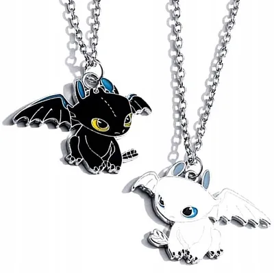 Two dragon necklaces, one black and one white, are displayed against a white background.
