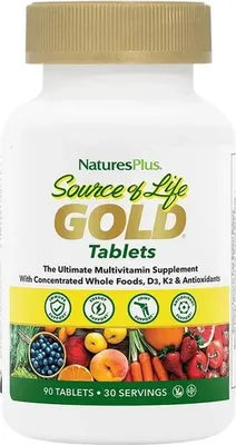 A white bottle of Natures Plus Source of Life Gold tablets with a gold cap.