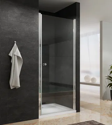 A modern bathroom with a frameless glass shower door.