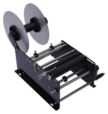 Produktbild von Etikettiermaschine Flaschen - Manuelles Rundflaschen Etikettiergerät - Hohe Präzision - 10–30 Stk/min - Für 2–12 cm runde Behälter - Tischgerät Stahl - Schwarz