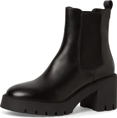 A single black leather Chelsea boot with a thick lug sole and block heel, shown against a white background.
