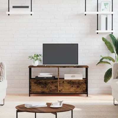 A TV stand with a TV on it, in a living room setting.