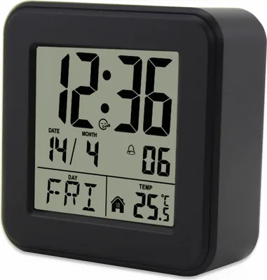 A digital alarm clock is shown against a light gray background.