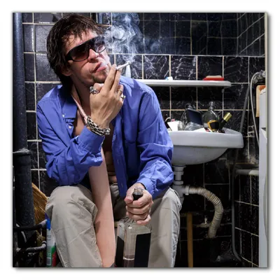 Produktbild von Wallario selbstklebende Möbelfolie/ Tischdecke für Innen und Außen, Größe: 80 x 80 cm - Kloparty - Sexy Mann auf Toilette mit Zigarette
