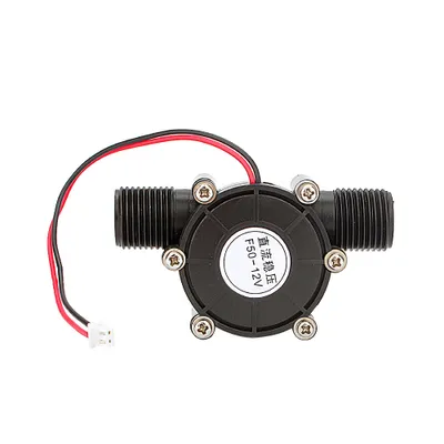 A black water flow generator with red and black wires attached, shown against a white background.