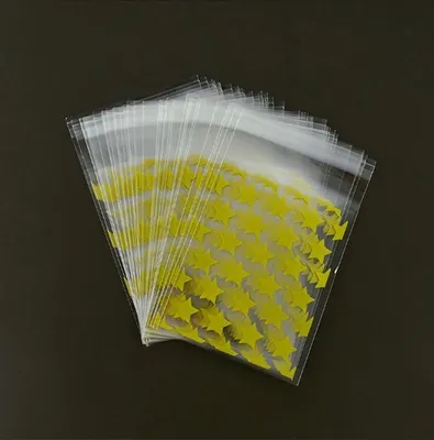 Image de Go Go Gadget – Sacs transparents pour cadeaux – Sachets pour friandises – Sacs cadeaux – 8 x 10 cm – Lot de 200 pièces – Transparents avec des étoiles dorées