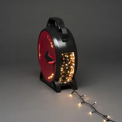 Zdjęcie produktu dla Konstsmide Micro LED ze zwijaczem kabla, 800 ciepłych białych diod, 30V, do użytku zewnętrznego (IP44), czarny miękki kabel - 3838-107