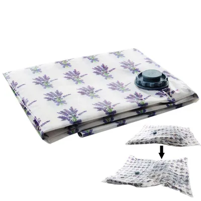 A folded vacuum storage bag with a lavender pattern and a valve, shown against a white background. Inset images show the bag being compressed.