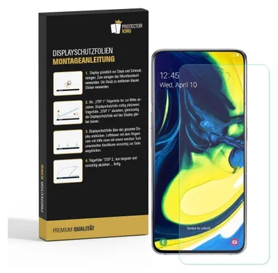 A product packaging box with installation instructions and a smartphone with a screen protector applied.