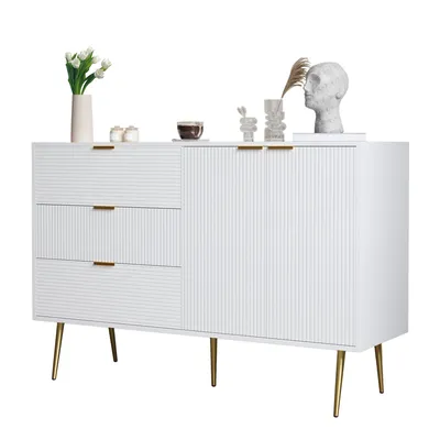 A white sideboard with gold legs and handles, decorated with vases, a bust, and a cup of coffee.