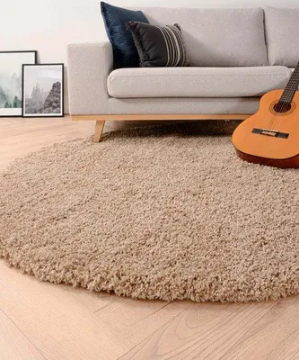 Imagen del producto de Alfombra redonda Unyqoos® de pelo alto, 240 cm de diámetro, color beige, material: polipropileno, altura del pelo: 5 cm, densidad: 3300 g/m², suave