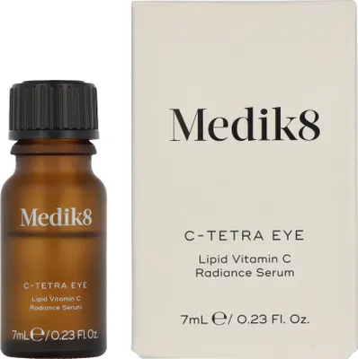 A product shot of a Medik8 C-Tetra Eye Lipid Vitamin C Radiance Serum bottle and its packaging.