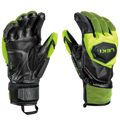 A pair of black and neon green ski gloves are shown against a white background.