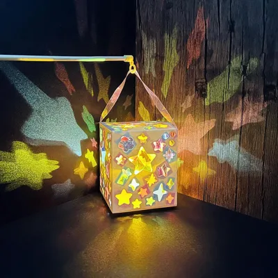 Immagine prodotto di Kit per creare lanterne di carta a forma di stella, con effetto vetro colorato, dimensioni 11 x 10 cm