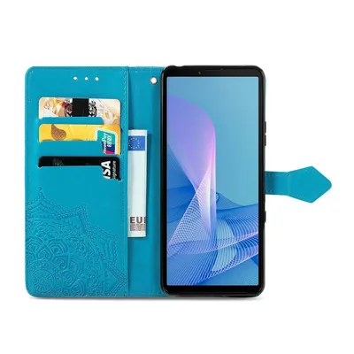 A blue flip case for a smartphone is shown open, with cards and a banknote inserted.