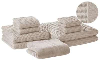 Image de BELIANI Lot de 9 serviettes de bain en coton beige absorbant à faible torsion