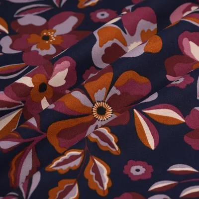 Productafbeelding van Bunte bloemenprint, katoenen stof, 150 cm breed, gecertificeerd volgens  standaard