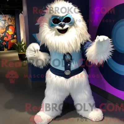 Imagen del producto de Personaje REDBROKOLY mascota de un Yeti azul marino vestido con jeggings y corbatas