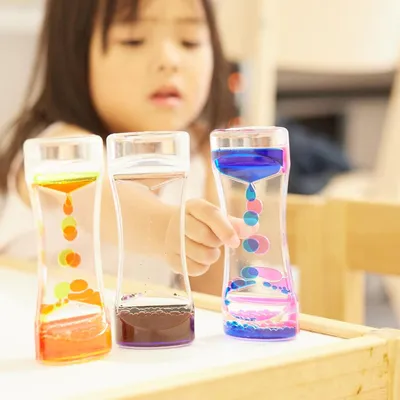 Imagen del producto de Temporizador de movimiento líquido, reloj de arena líquido para niños: calmante y relajante, juguete sensorial, juguete antiestrés para TDAH, 145 cm, 5 colores