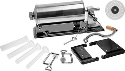 A set of sausage stuffing equipment laid out on a white background.