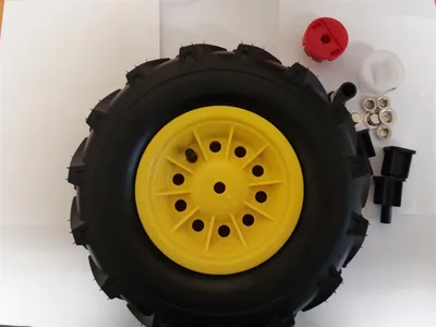 Produktbild von Rolly Toys Vorderrad Ersatzrad rechts Luftbereifung 6 Zoll 310-95 mit Felge gelb Tracs Traktoren und Unimog