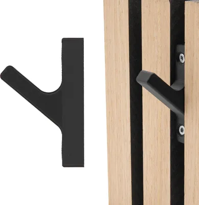 A black hook is shown next to wooden paneling, with one hook attached to the paneling.