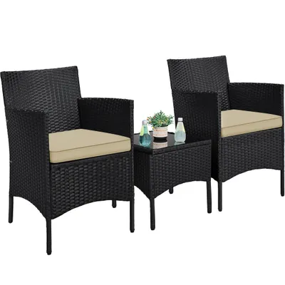 A black rattan garden furniture set with khaki cushions, consisting of two chairs and a small table, is displayed against a white background.