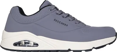 A side view of a gray Skechers sneaker with a white sole.