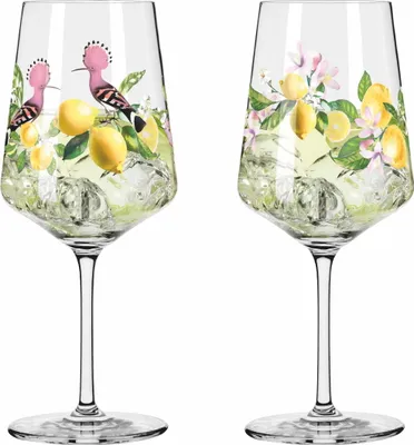 Two clear wine glasses filled with ice and a drink, decorated with illustrations of lemons, flowers, and birds.