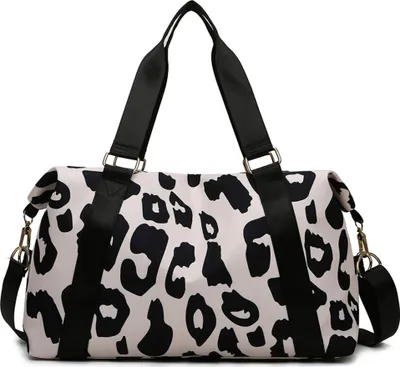 A leopard print duffel bag with black straps and gold hardware, shown against a white background.